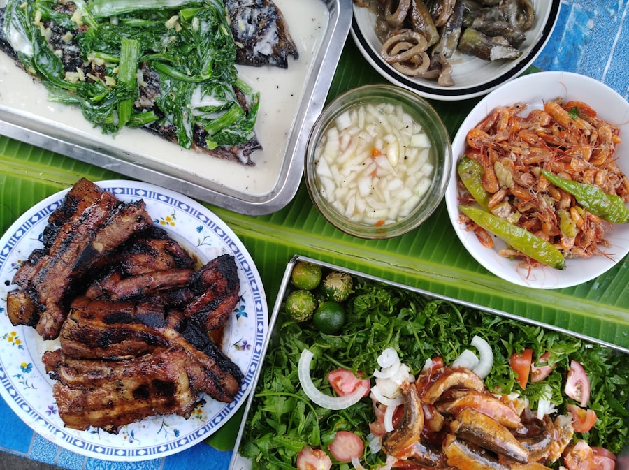 Home-style Filipino dishes including grilled liempo, ginataang gulay, ensalada and sinigang sides