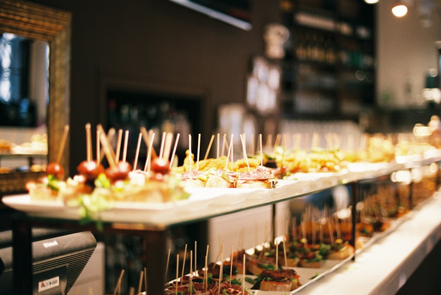 A line of plated appetizers and finger food ready for guests