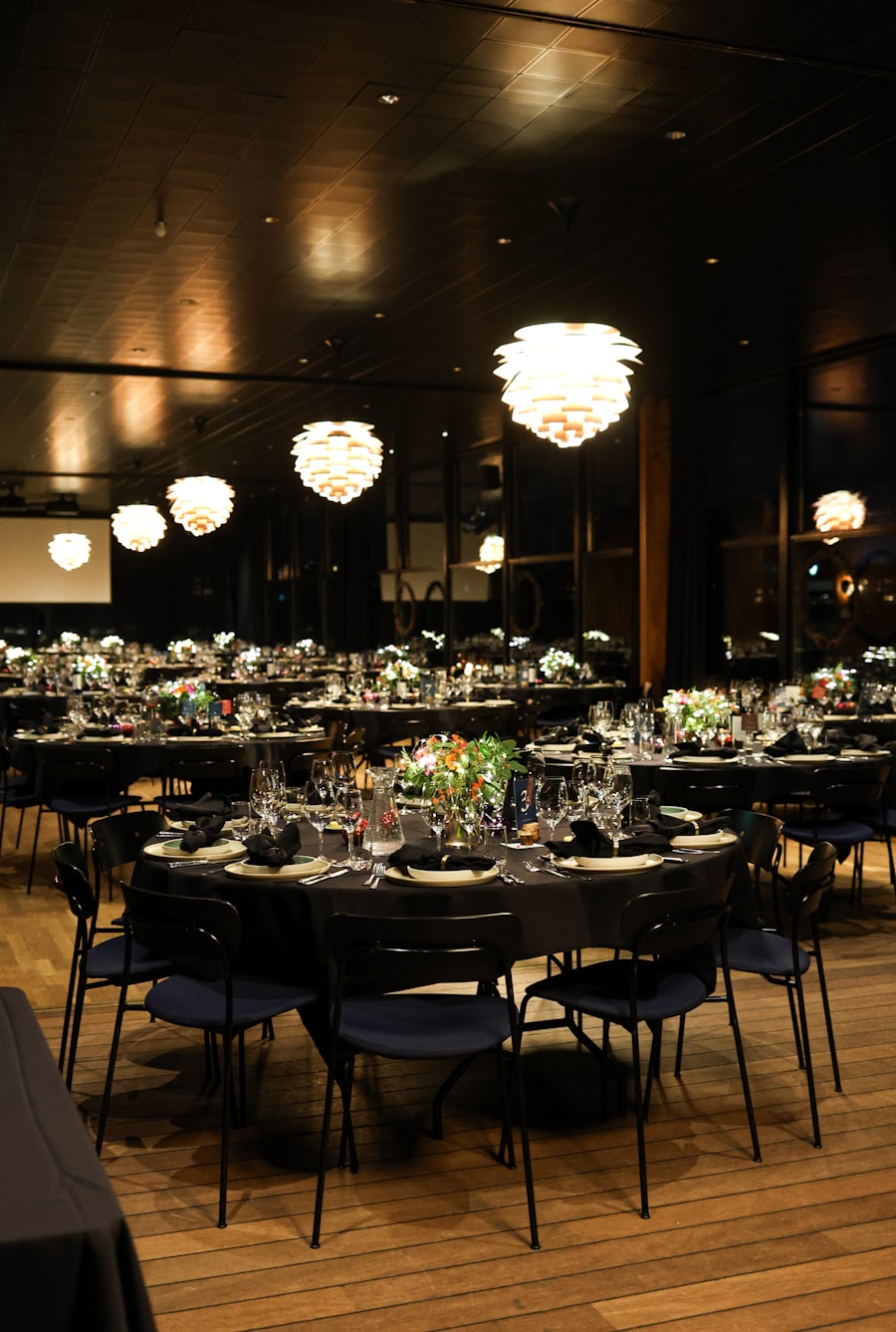 Reception hall set with round guest tables for a formal event